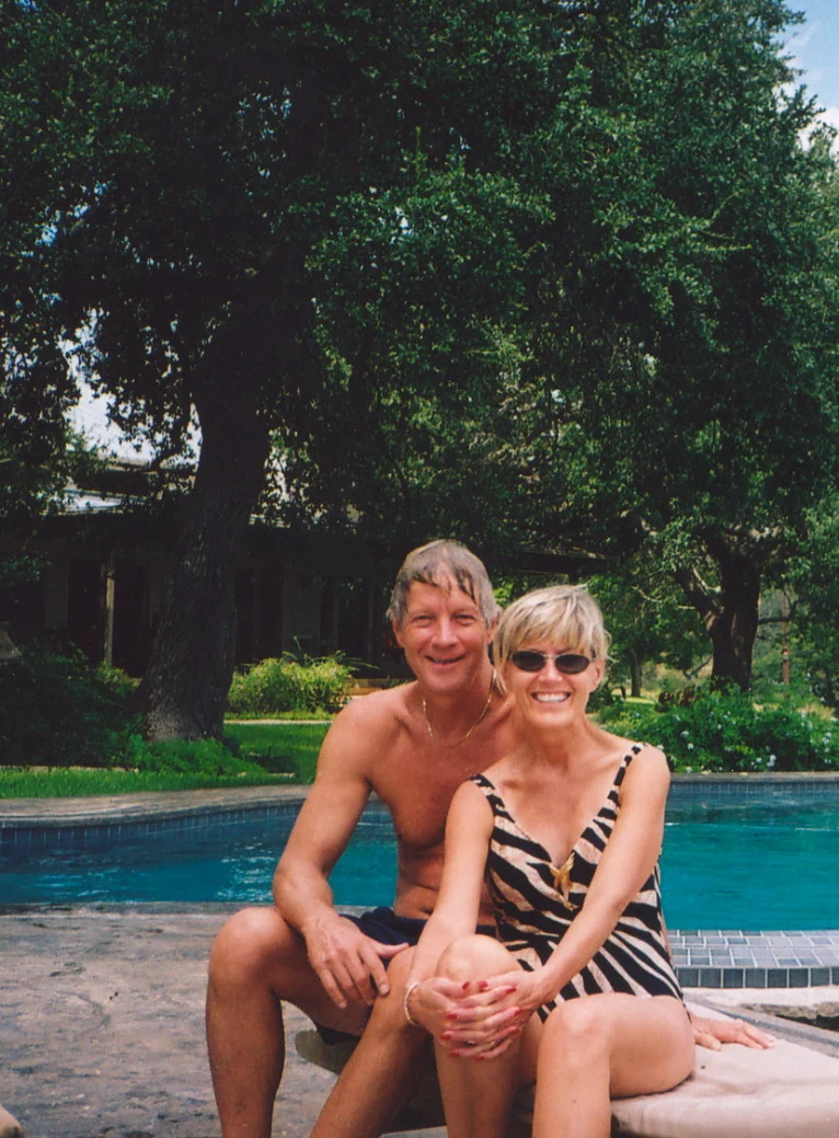 Cute older couple smiling at the pool at Paniolo Ranch